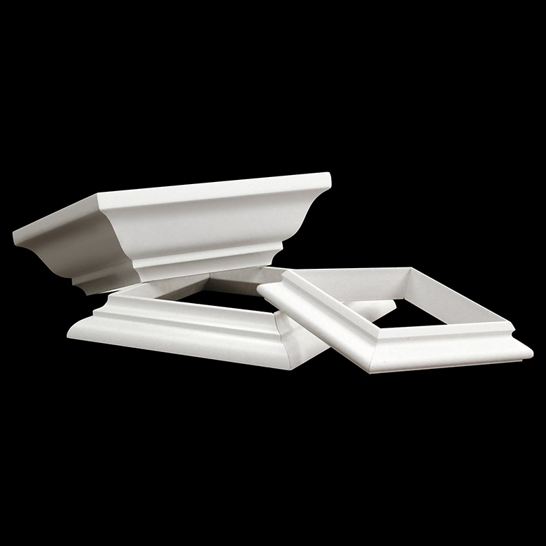 Stacked white picture frames on a black background