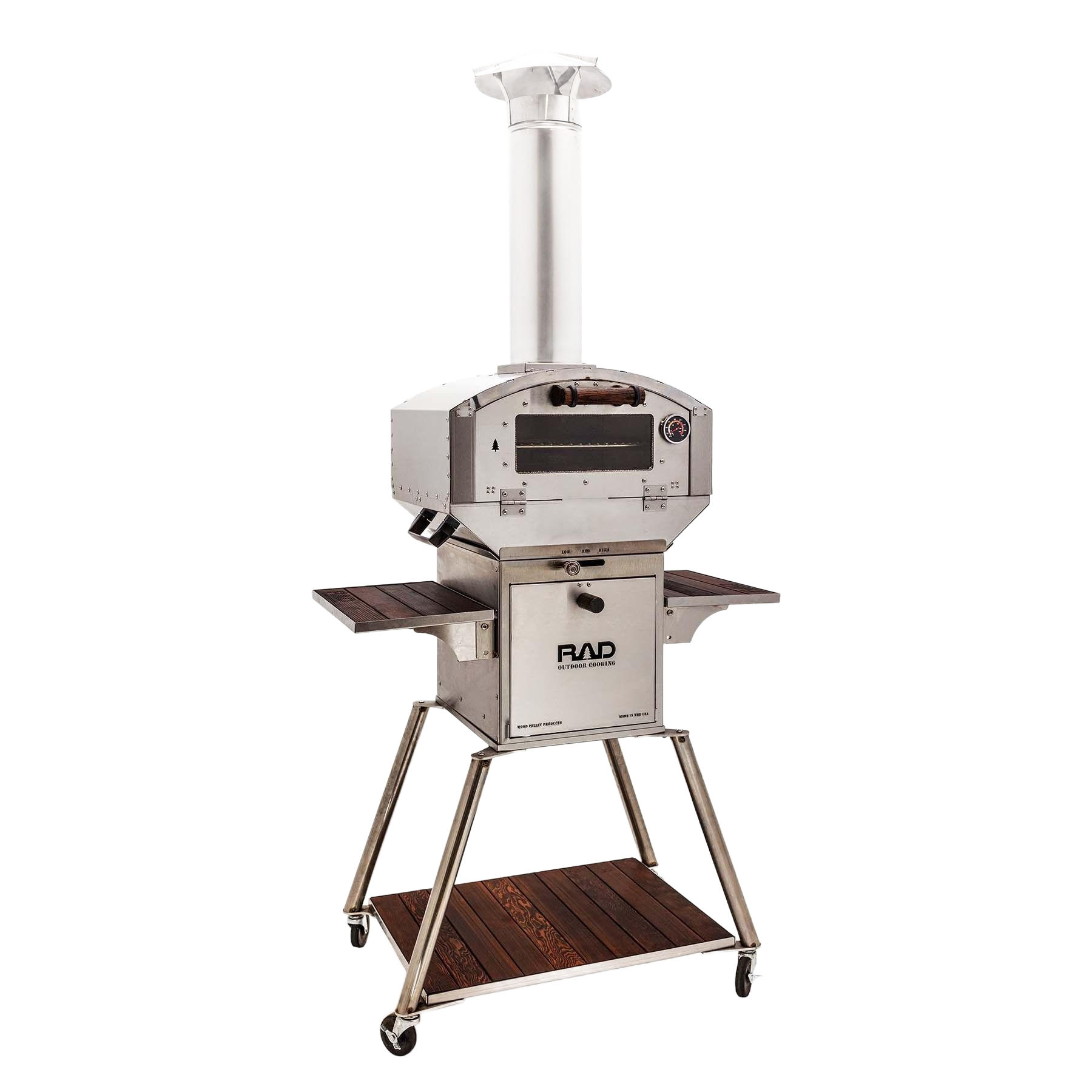 A stainless steel outdoor pizza oven on a rolling cart with a wooden shelf, a chimney, and side prep tables.