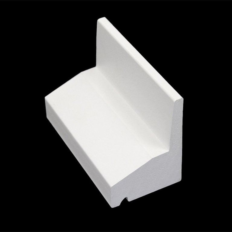 White L-shaped plastic bracket with a tall backplate on a black background