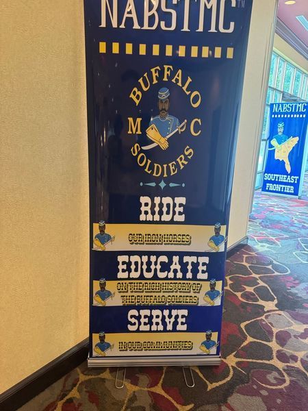 Banner for Buffalo Soldiers MC: Ride, Educate, Serve. Blue, gold design with logo and text.