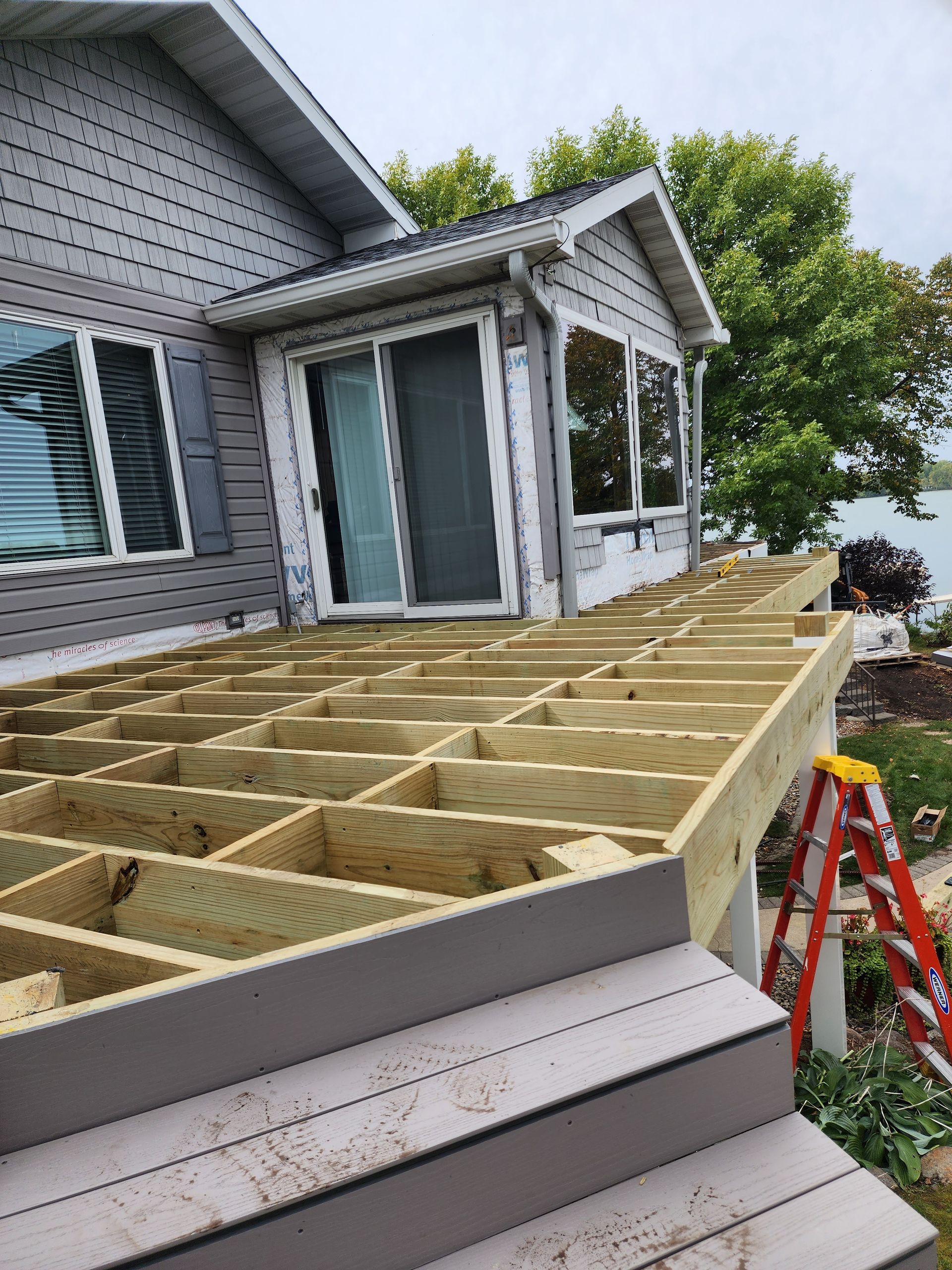 Deck Is Being Installed In The Yard — Spirit Lake, IA — Luke's Construction