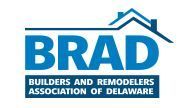 Logo for BRAD, the Builders and Remodelers Association of Delaware. Blue text and house outline.