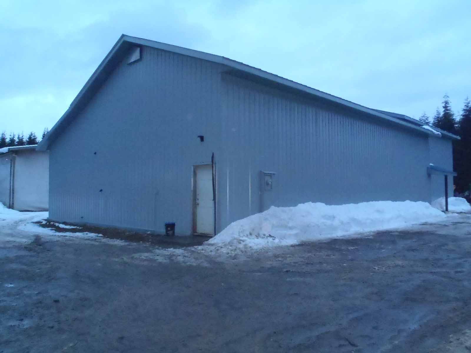 A building with a roof that is covered in snow
