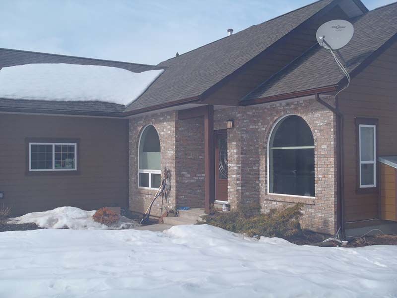 A house with a satellite dish on the roof