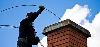 chimney being cleaned