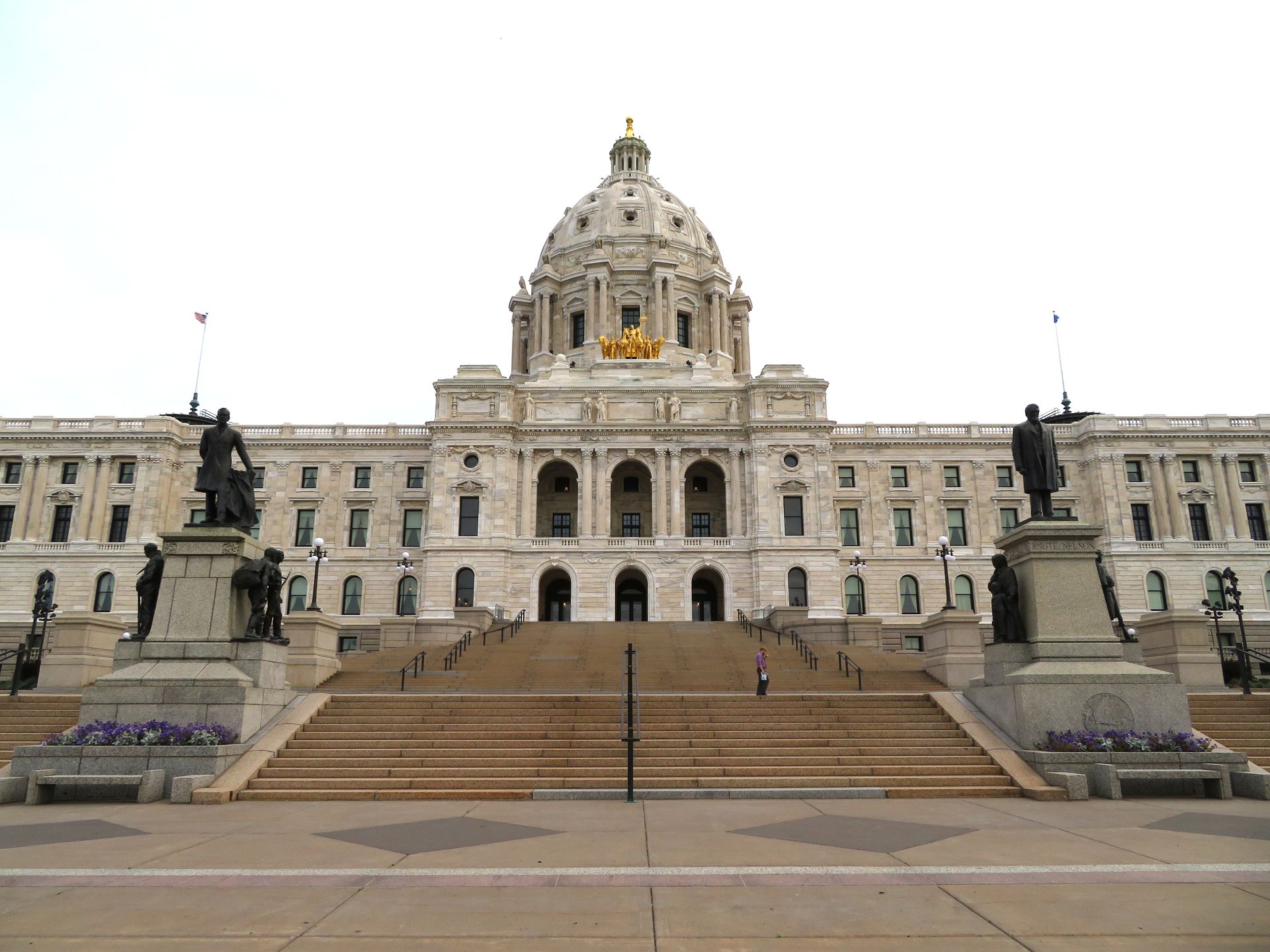 Minnesota State Capitol building, white stone structure with a large dome, steps leading up.