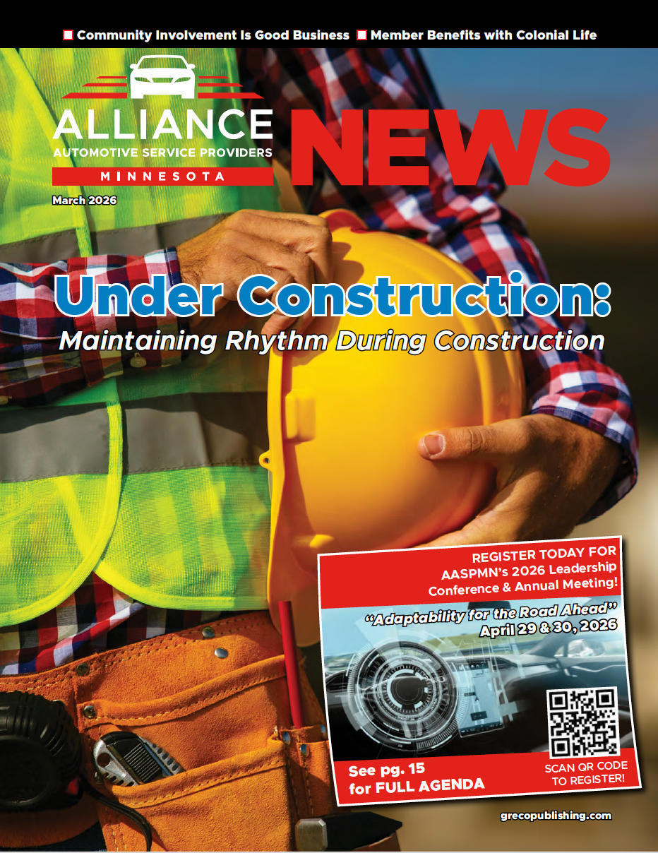 Cover of a construction industry newsletter with a worker holding a hard hat.