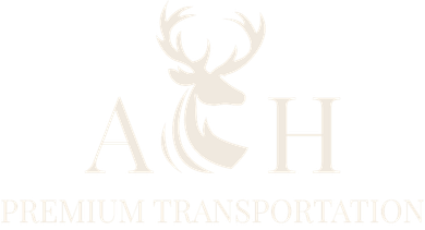 Logo of ACH Premium Transportation featuring a stylized deer with antlers between the letters A and H.
