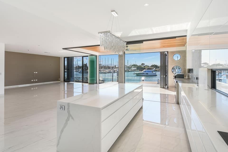 There Is A Large Island In The Middle Of The Room — Simonetto'S Cabinets & Joinery in Nambour, QLD