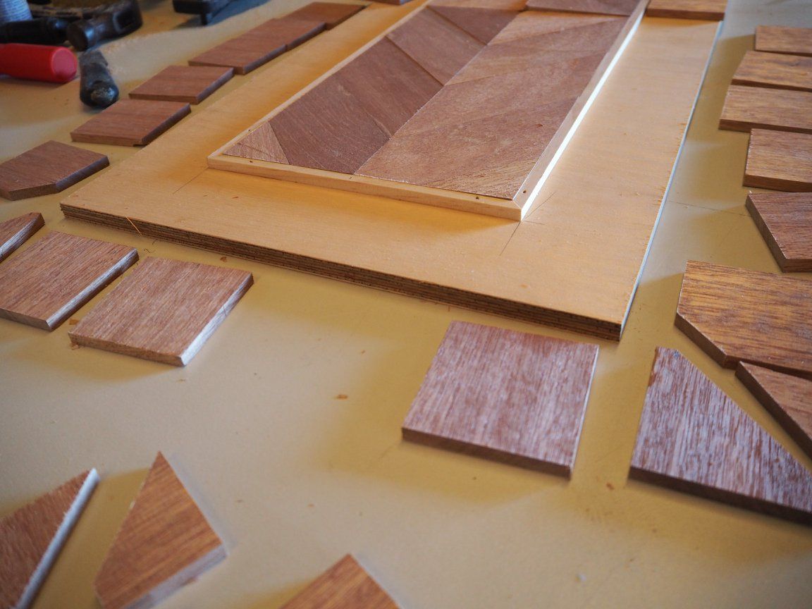 A Table with A Lot of Wood Pieces on It — Simonetto'S Cabinets & Joinery in Buderim, QLD