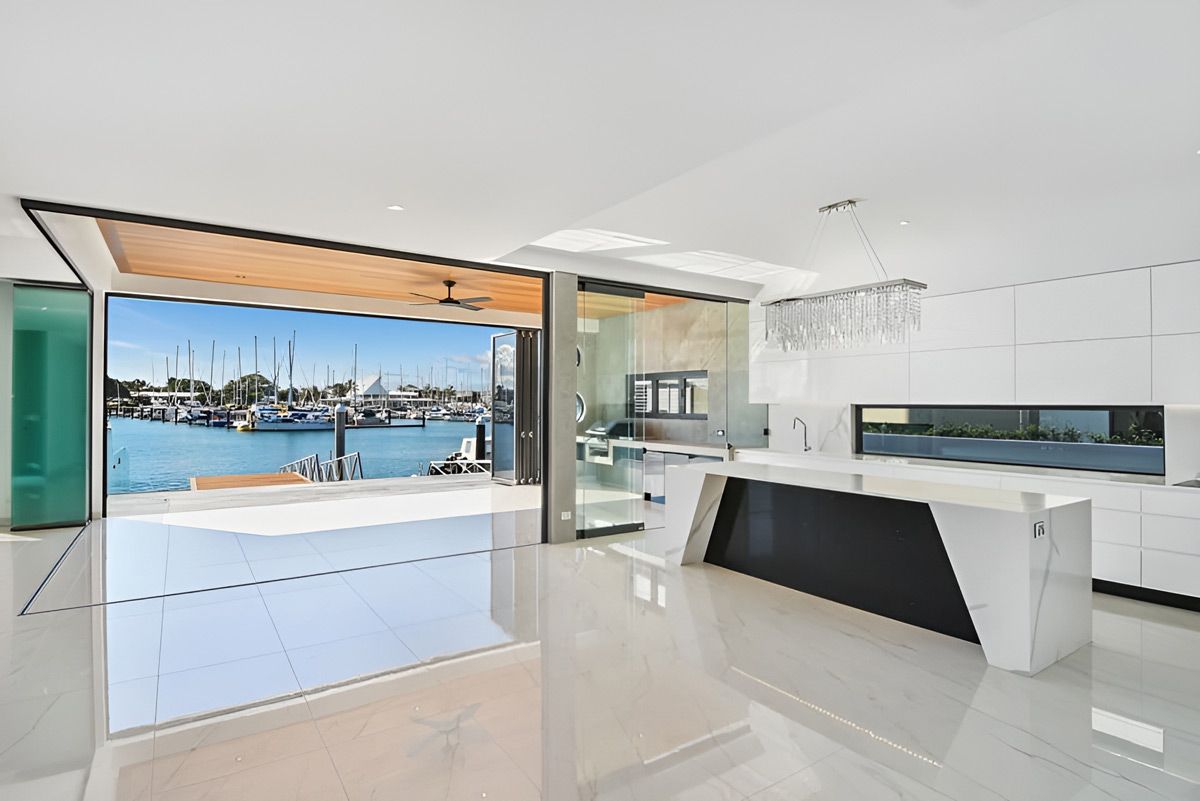 A Modern Kitchen With a Large Island and a View of the Water — Simonetto'S Cabinets & Joinery in Nambour, QLD