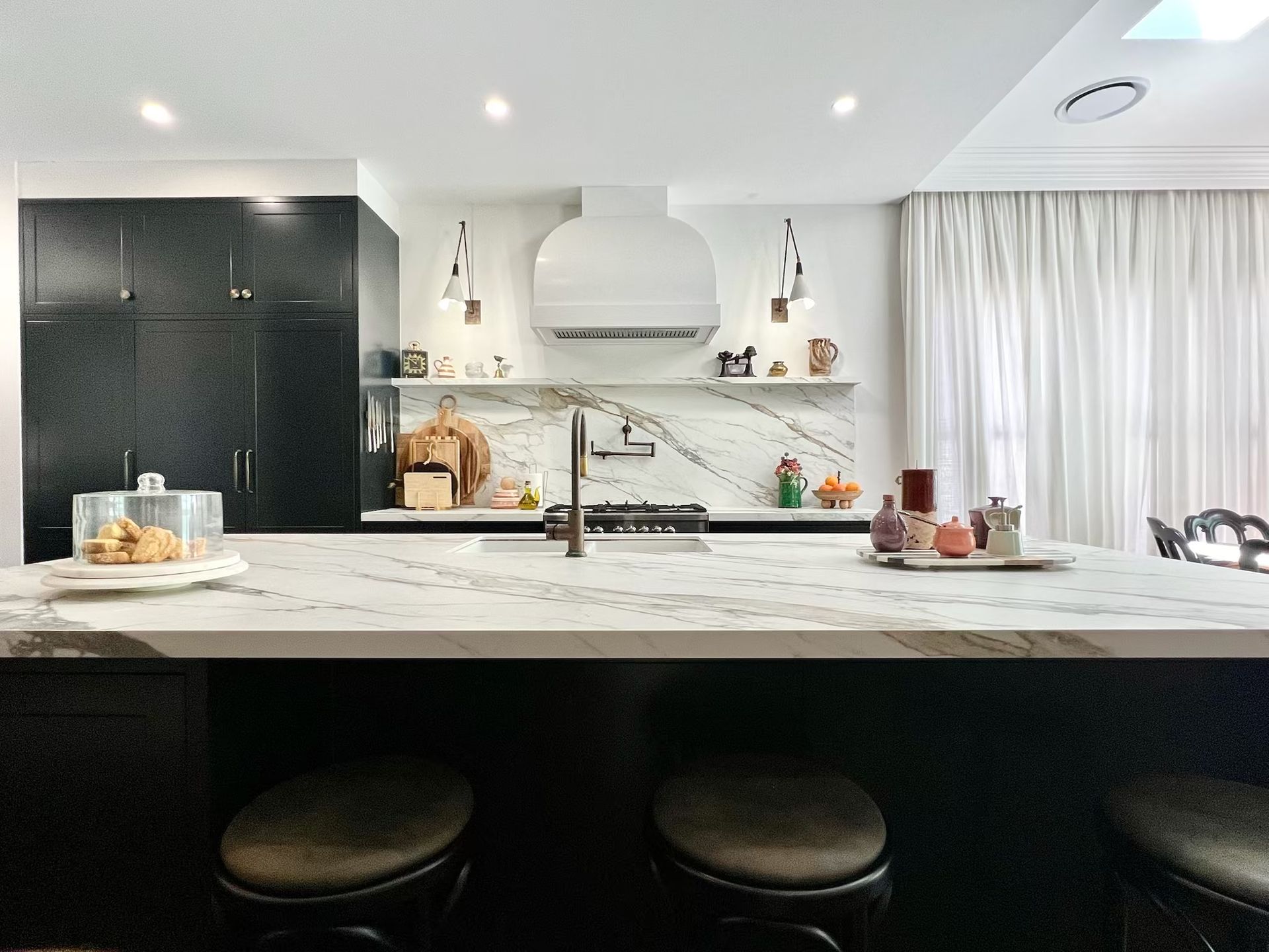 Modern Kitchen With White Cabinetry and Gray Countertops