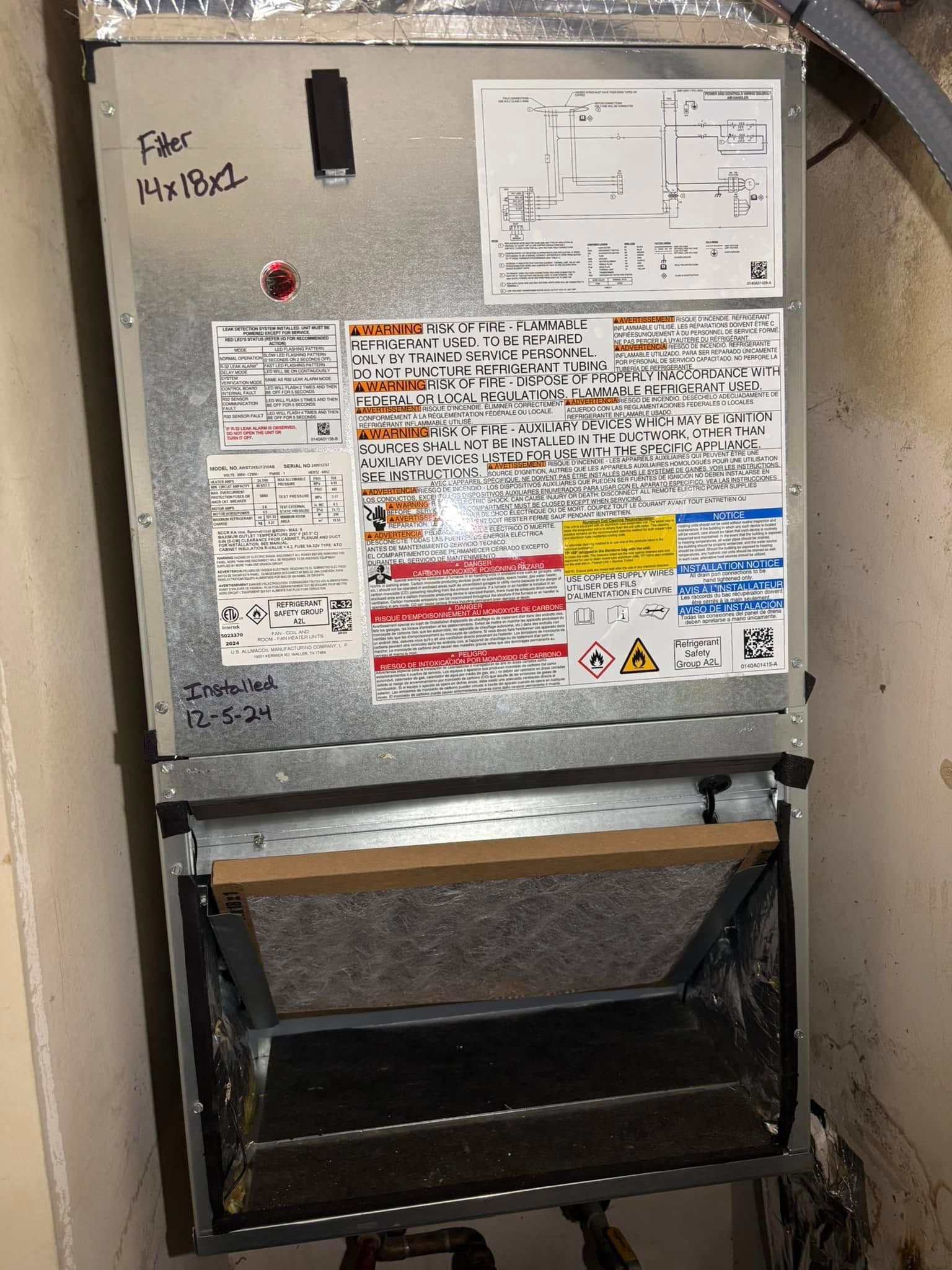 A refrigerator with a lot of stickers on it