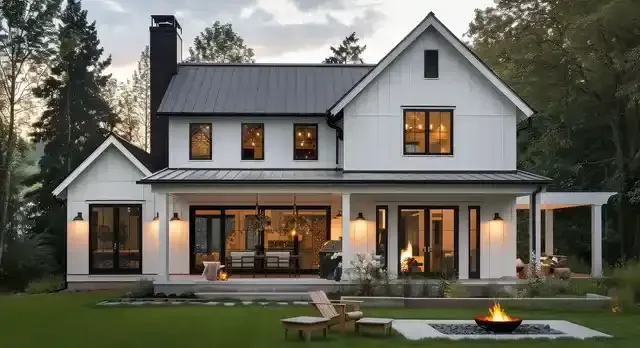 A close up of a metal roof on a white home. 