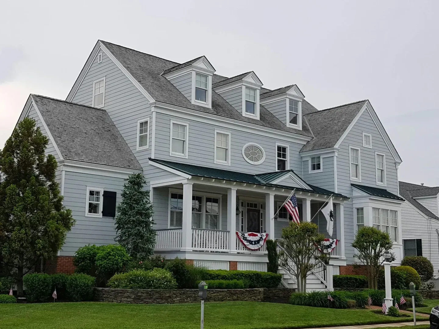 A beautiful Boston home with new siding.