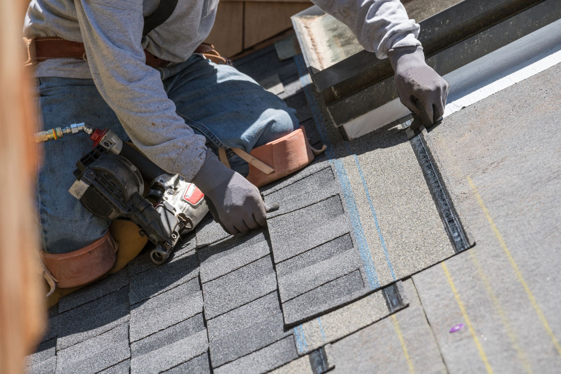A person working on a roof.