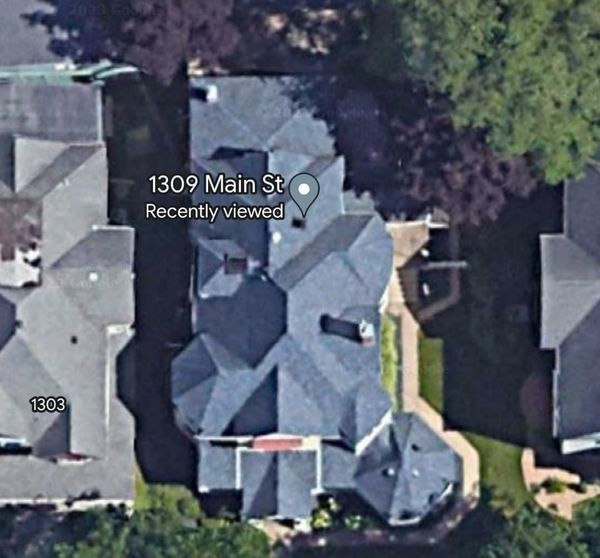 An aerial view of a house on main street — Holmen, WI — Riverland Exteriors Corporation