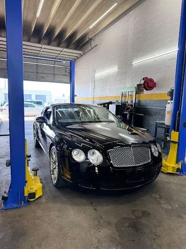 shop front with sports cars - Jimmy's German Auto Repair