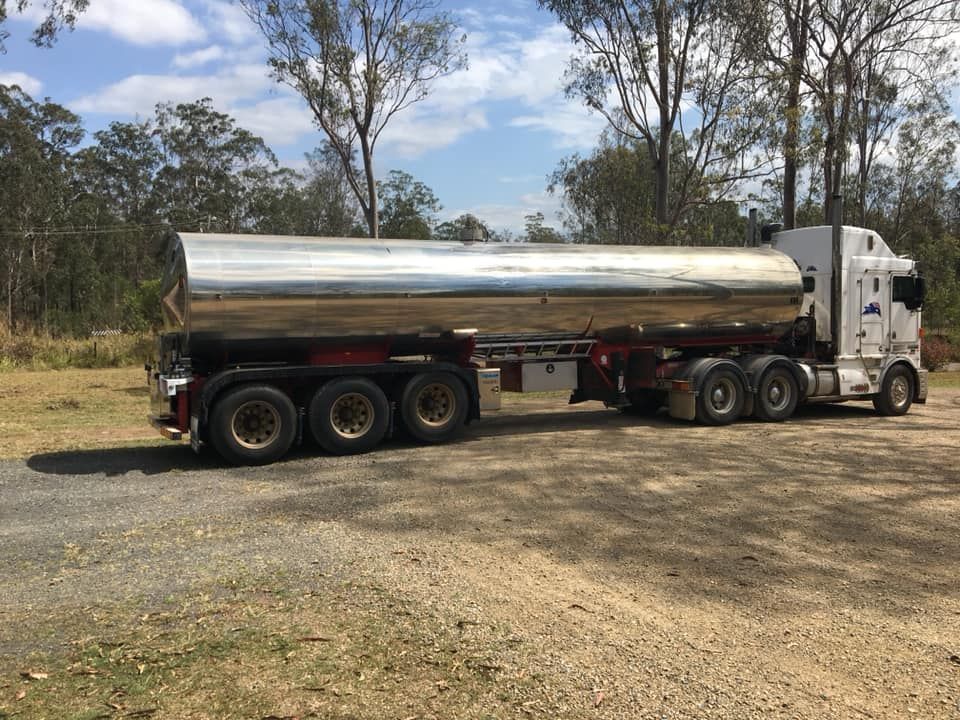 A Large Tanker Truck Is Parked on The Side of The Road — Stolzenberg Water Carriers in Chatsworth, QLD