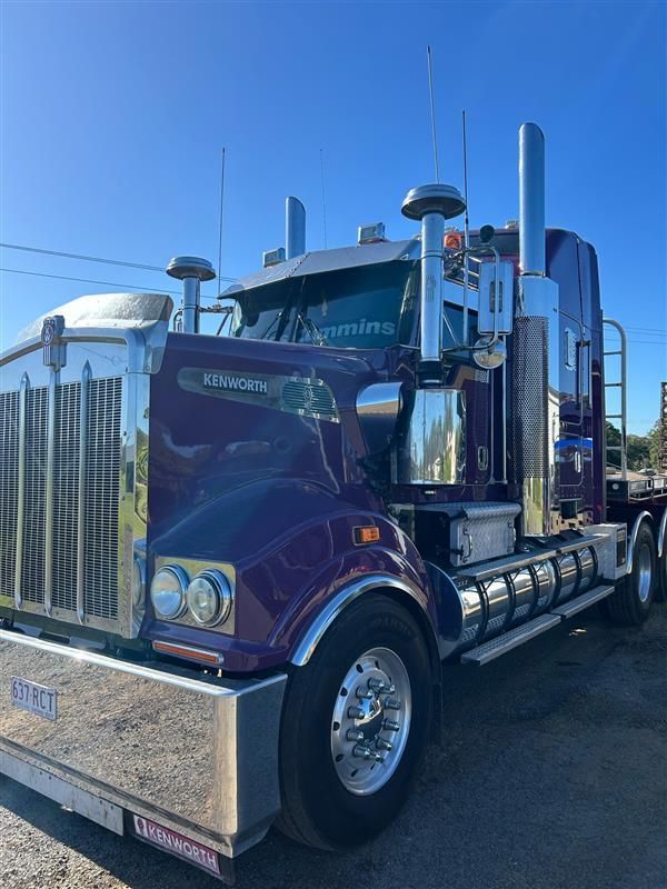 A Purple Semi Truck Is Parked on The Side of The Road — Stolzenberg Water Carriers in Chatsworth, QLD