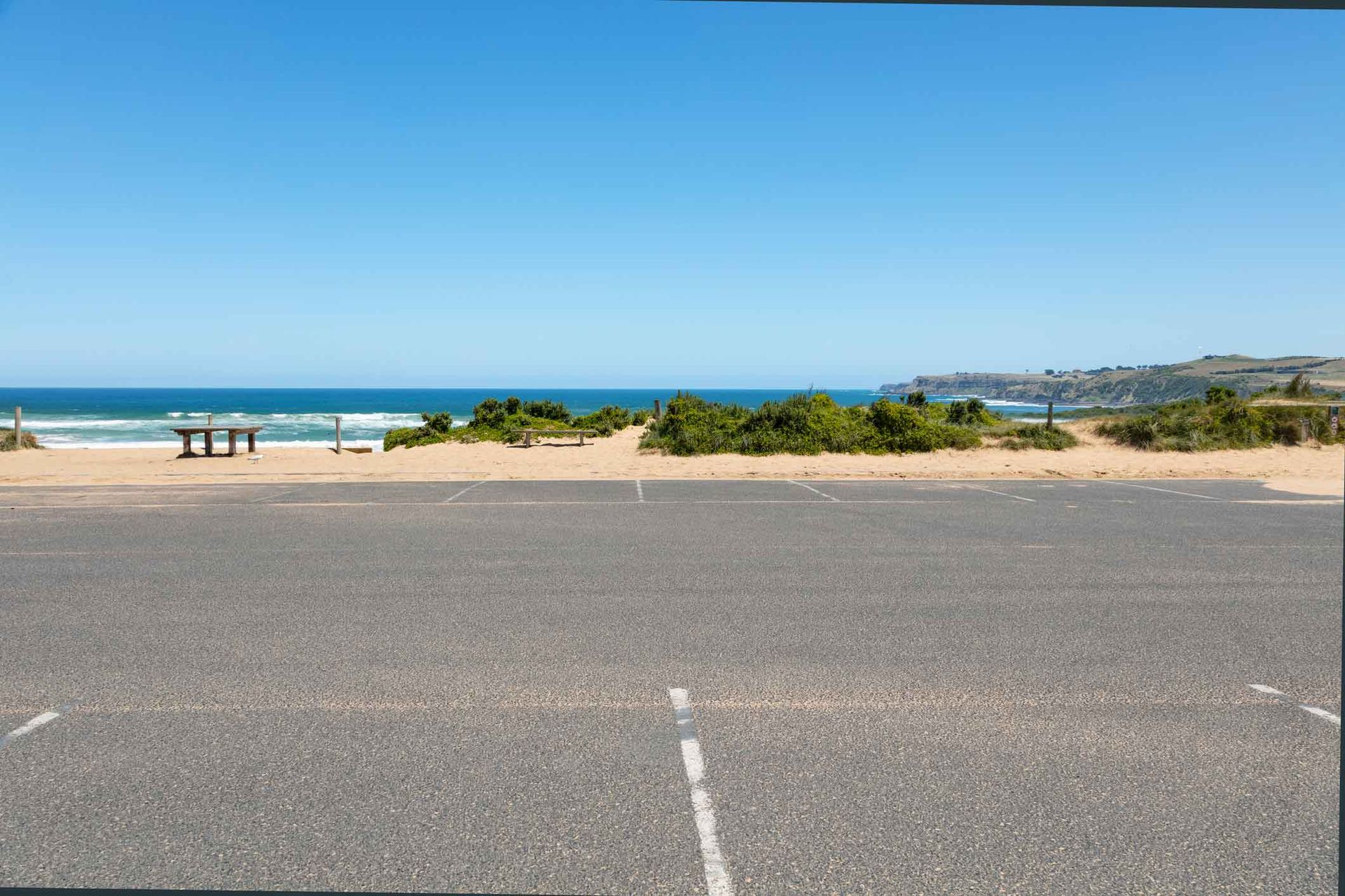 An Empty Parking Lot With A View Of The Ocean – Port Pirie, SA - Flinders Earthmoving & Blue Metal Supplies