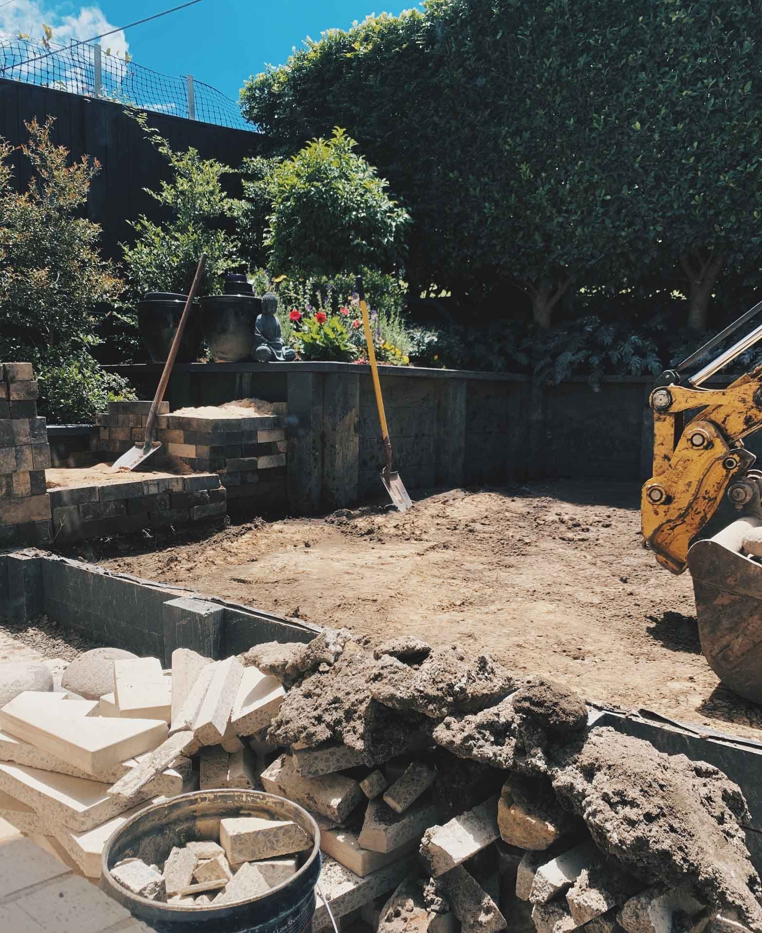 A Construction Site With A Yellow Bulldozer And A Shovel – Port Pirie, SA - Flinders Earthmoving & Blue Metal Supplies