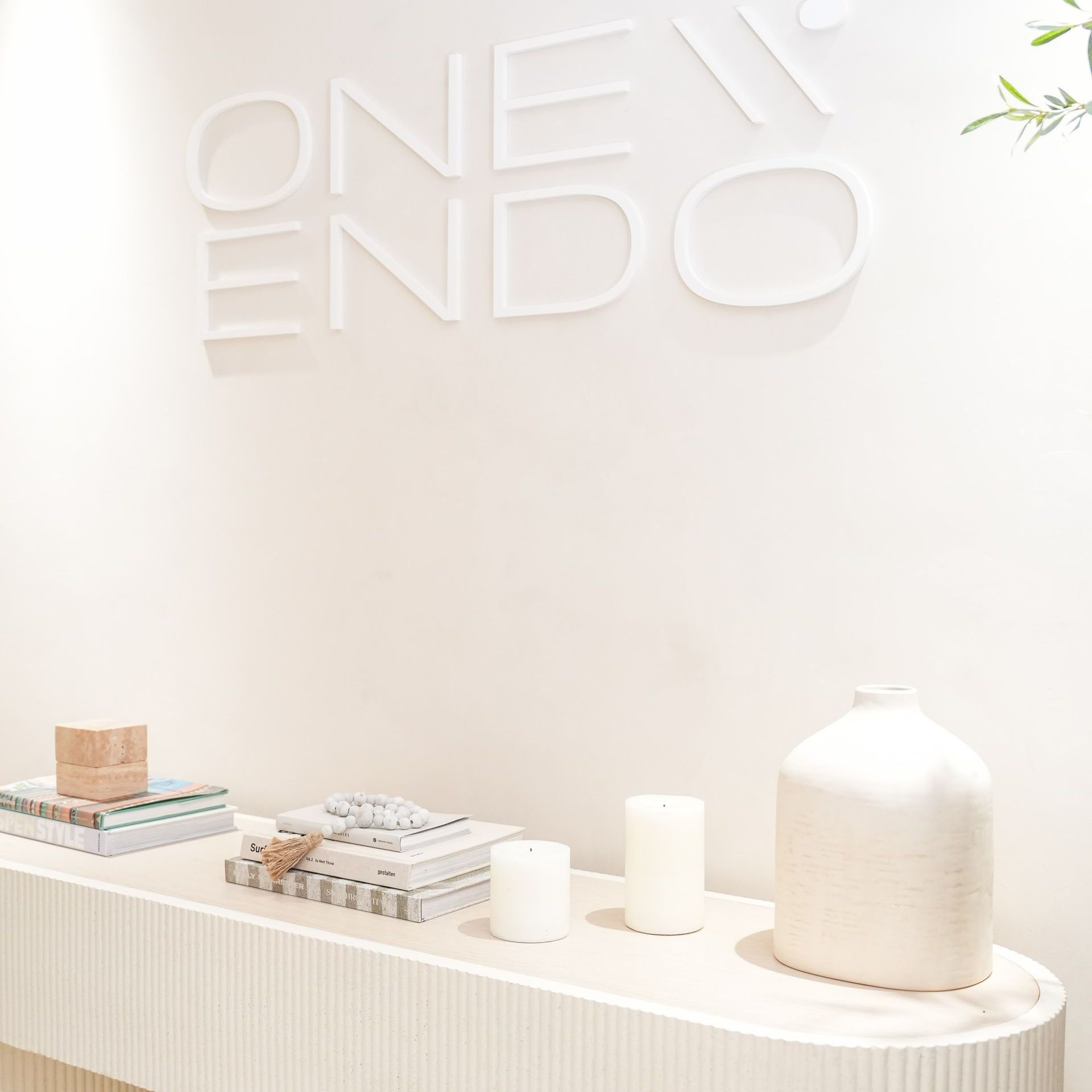 A white reception area with the name