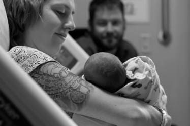 Mother and Child with Father on the Background - Photography in Colorado Springs, CO