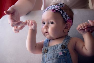 Baby Holding Fingers - Photography in Colorado Springs, CO