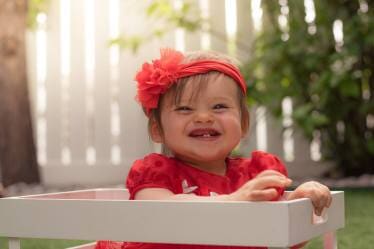 Smiling Baby in Red - Photography in Colorado Springs, CO
