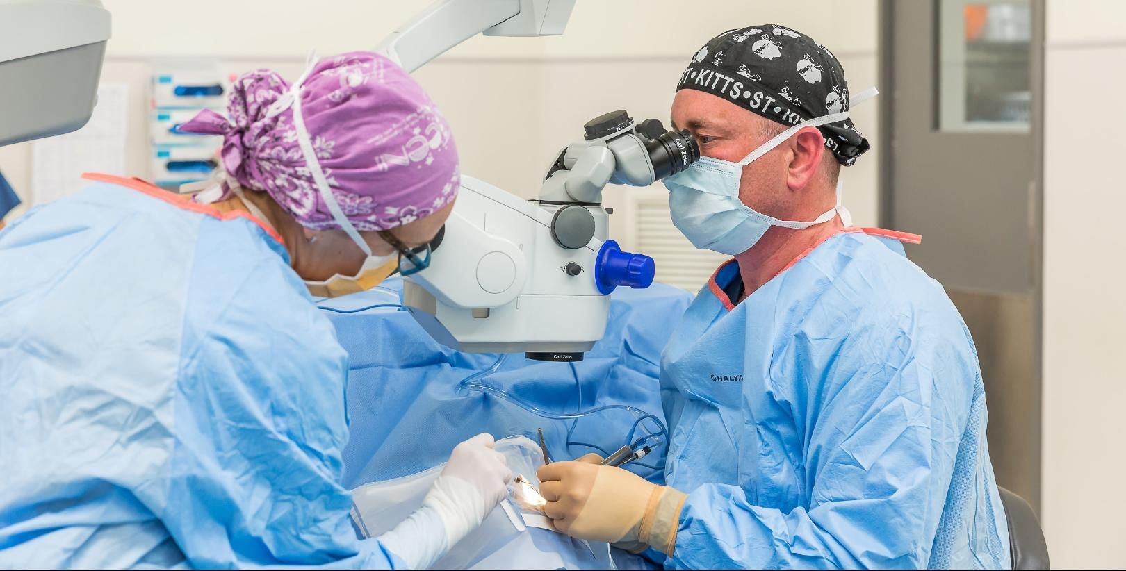 Two Surgeons Are Operating On A Patient In An Operating Room — CQ Eye In Berserker, QLD