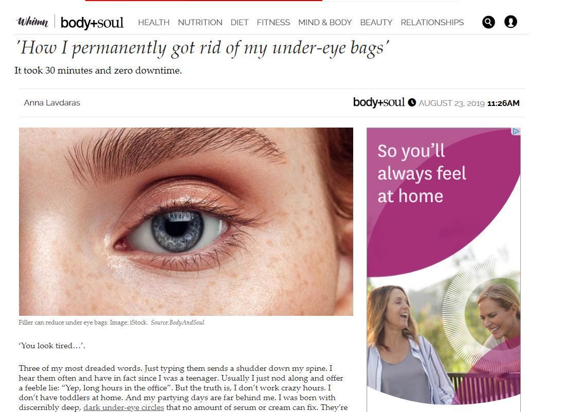 Close-up of a blue eye with pink eyeshadow. Text: 