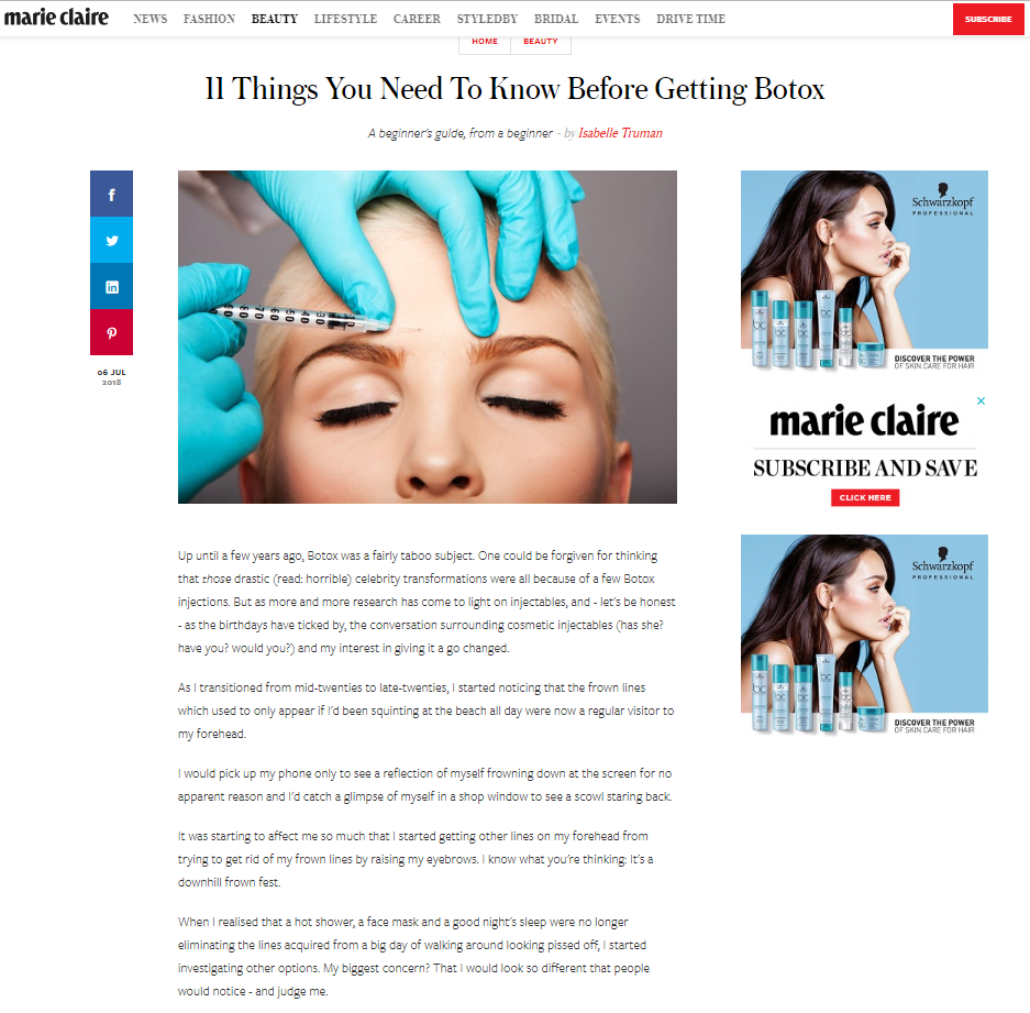 Woman receiving Botox injection in forehead.