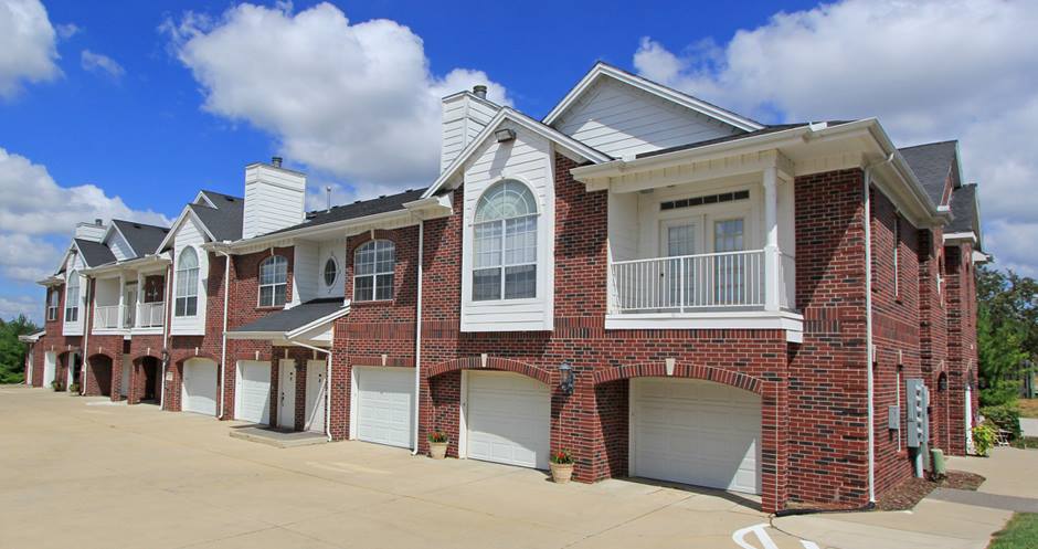 Custom Storm Doors — Red Brick House in Des Moines, IA