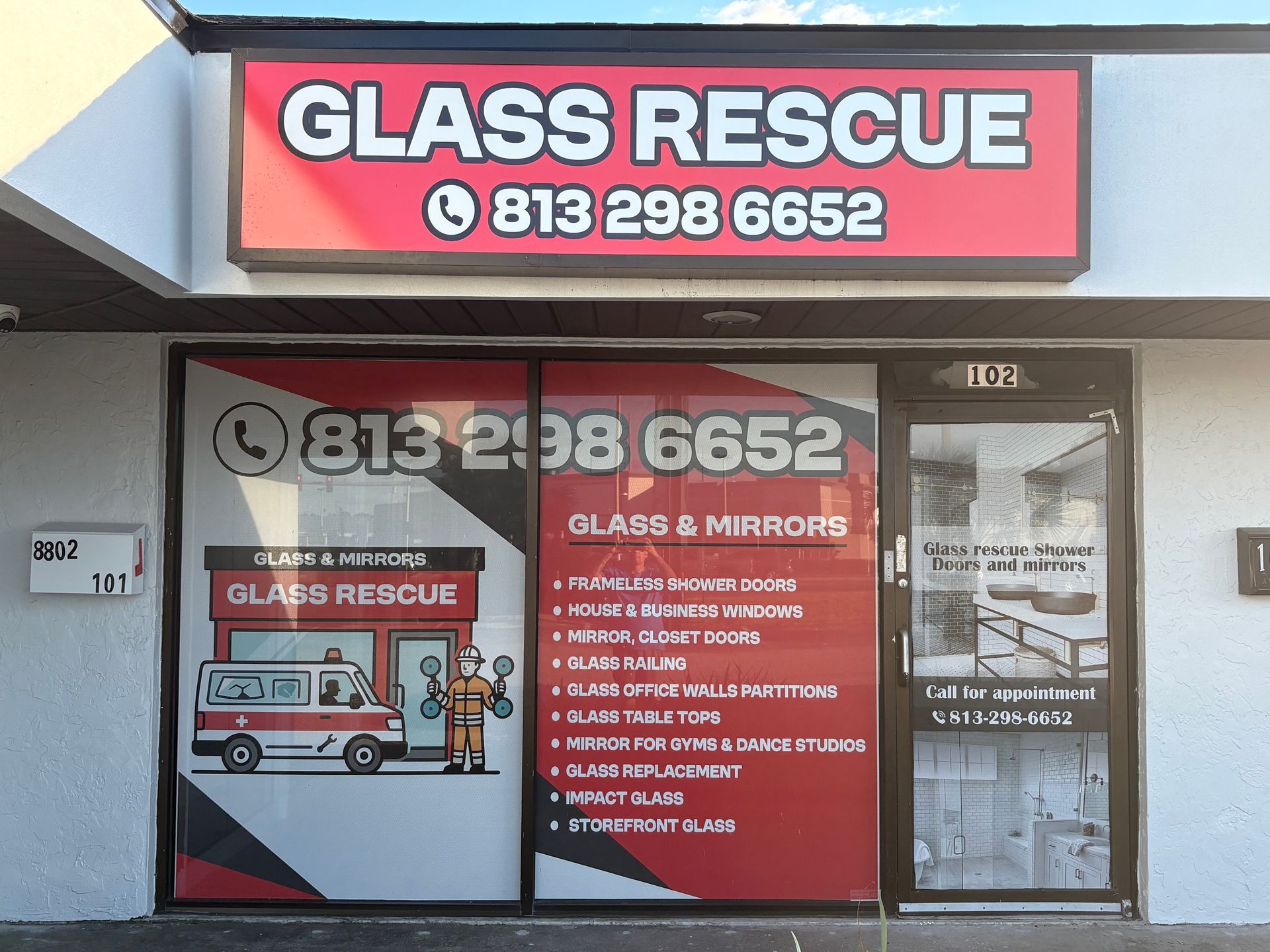 Glass Rescue storefront with red and white signage. A phone number is visible.