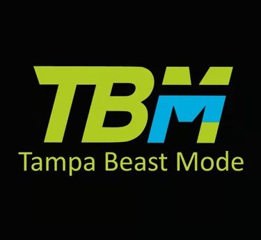 A man is standing in front of a house being built.