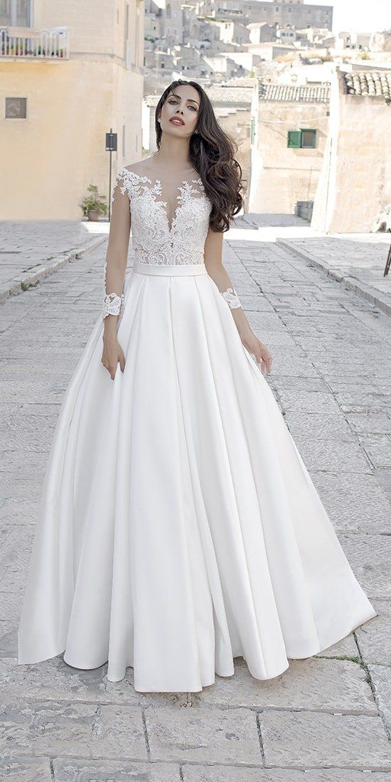 abito da sposa gonna e maniche lunghe