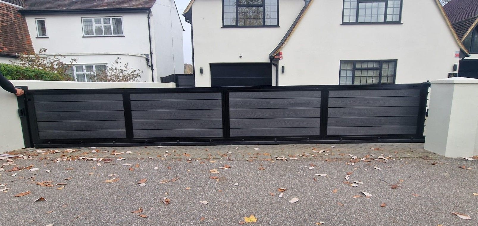 Completed 6m composite electric sliding gate
