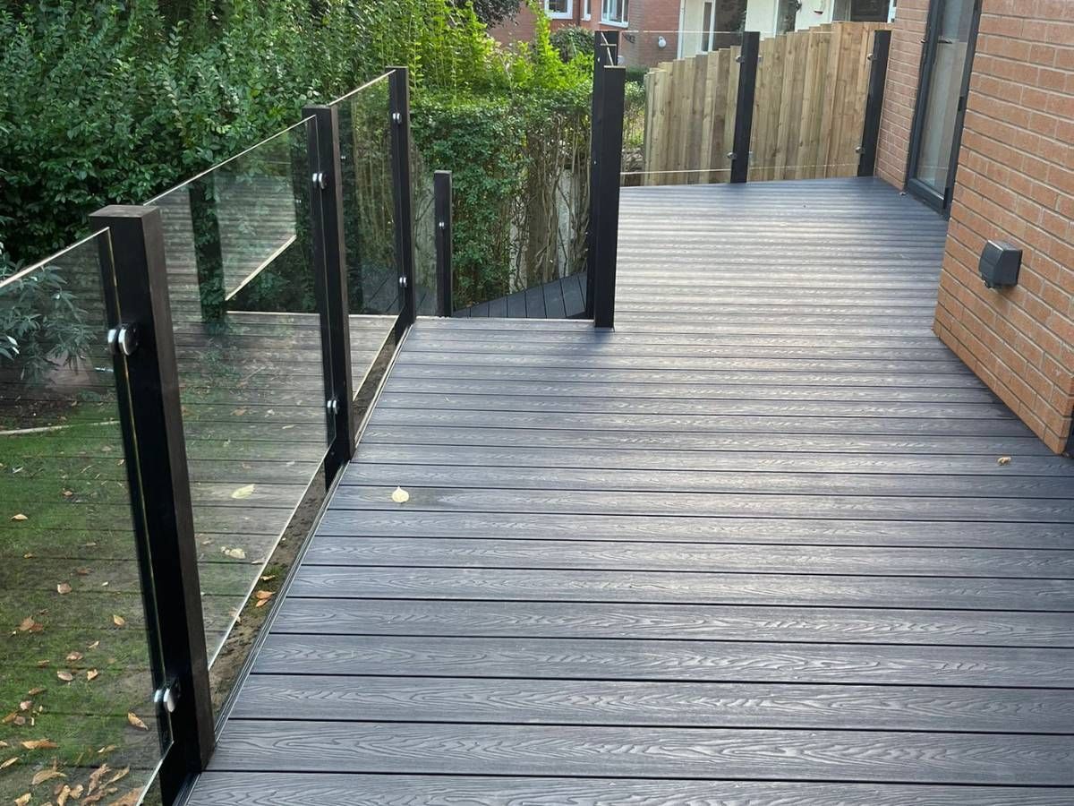 Composite Gates UK Raised composite decking leading to steps and ramp