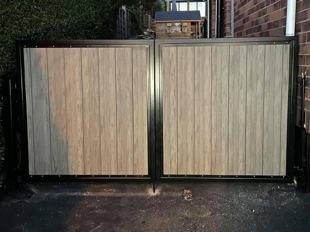 light grey 4 foot high composite driveway gates