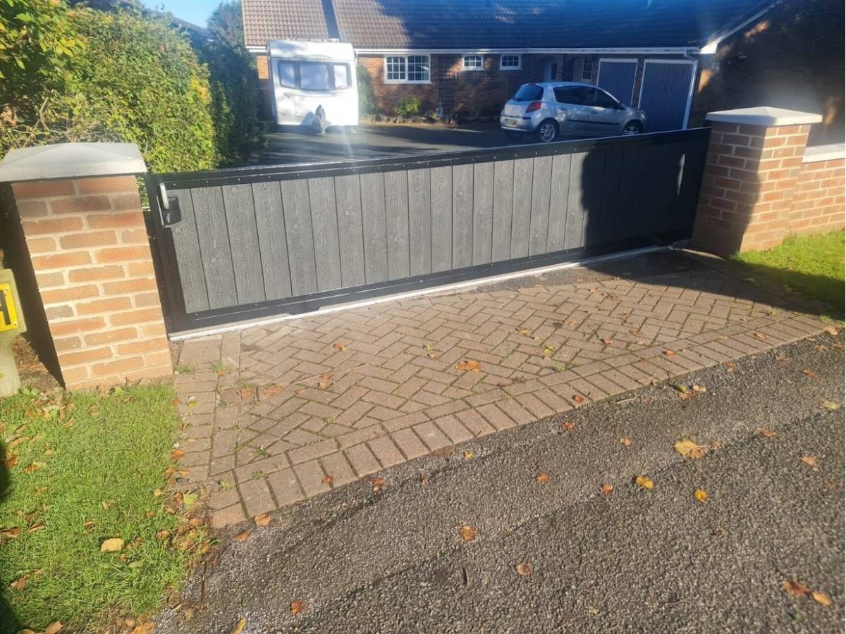 3 foot high sliding composite driveway gate