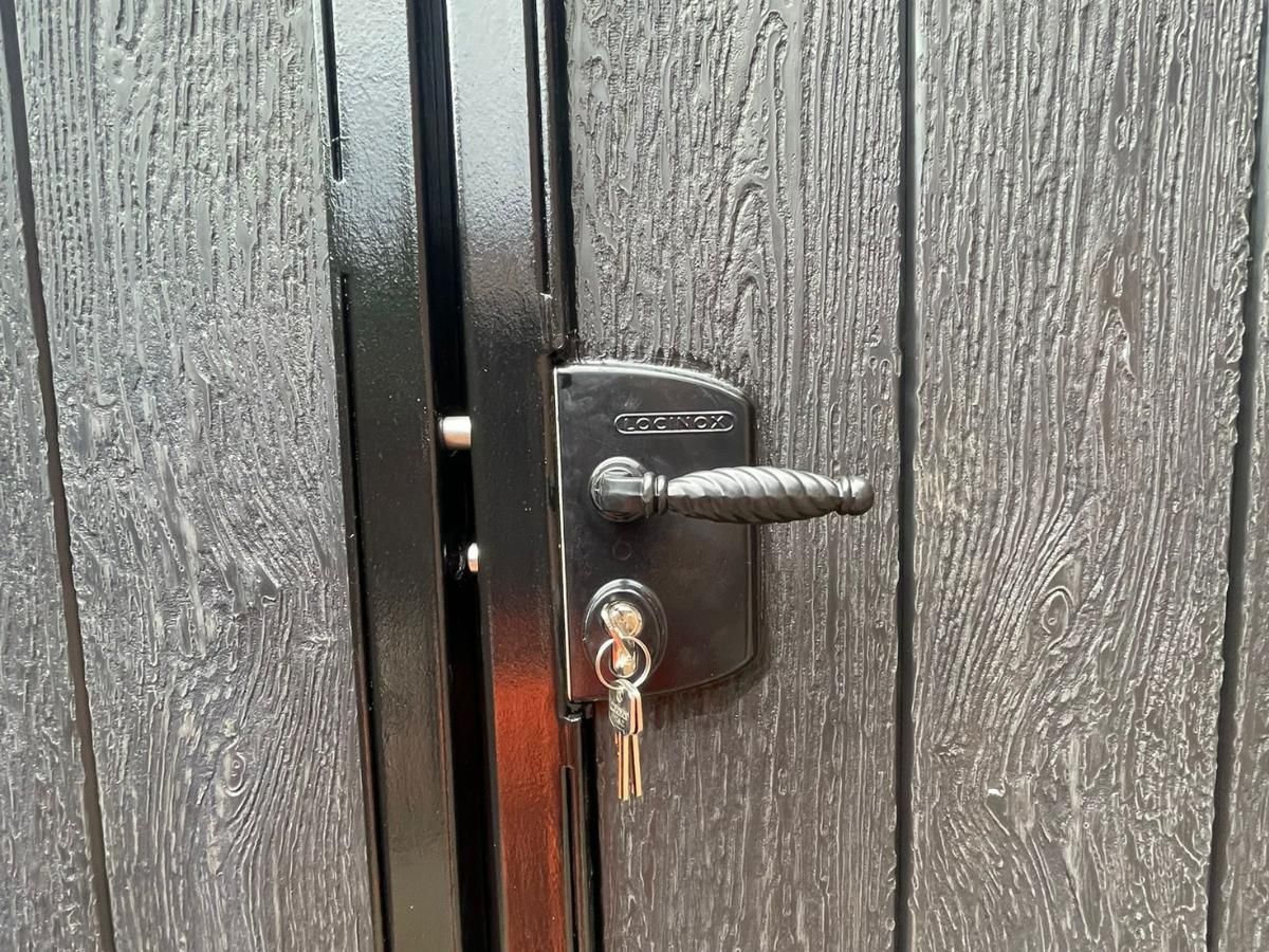 Close up of Locinox locking handle used for composite gates