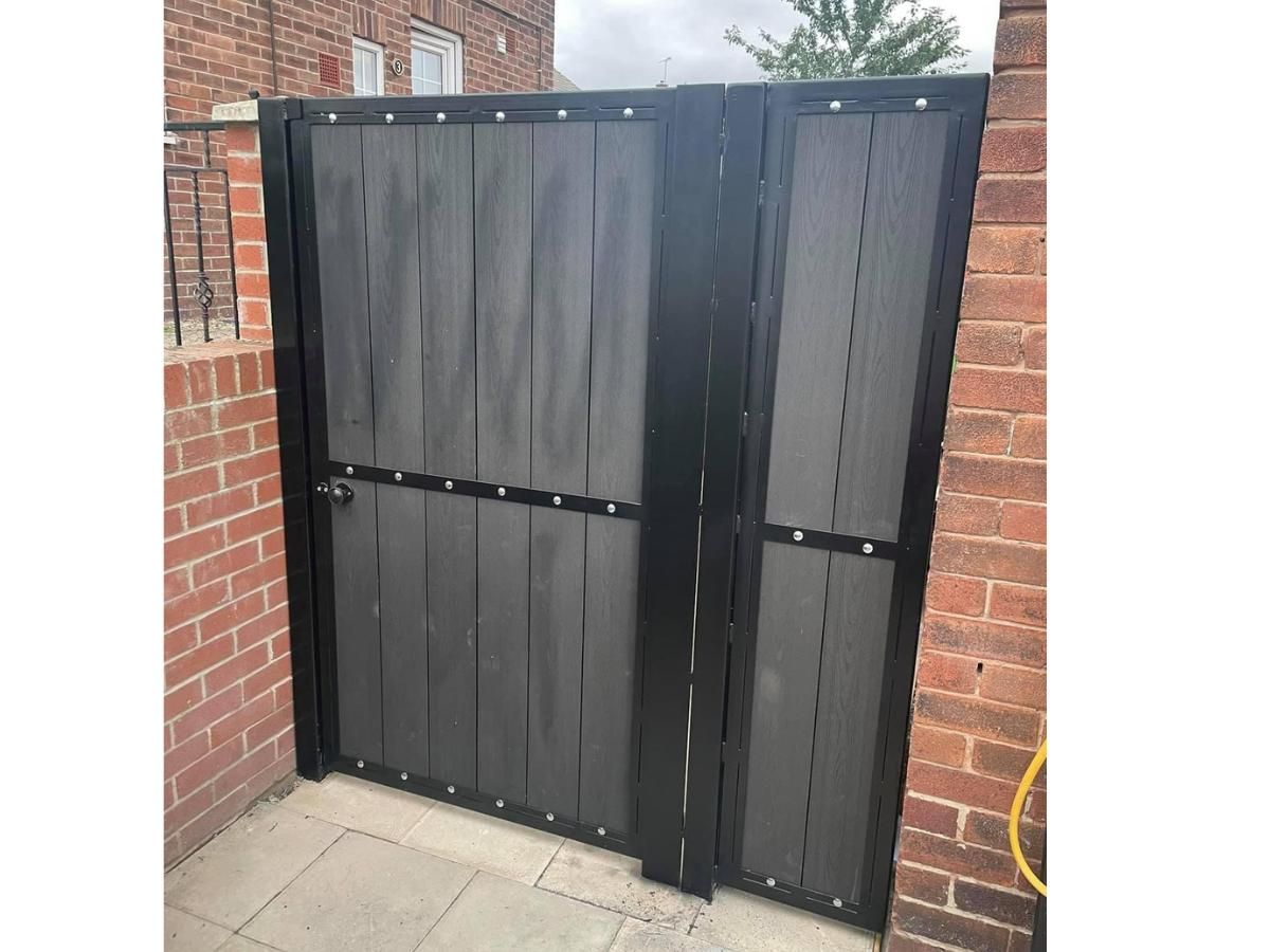 grey composite back gate with infill composite panel installed in Tamworth
