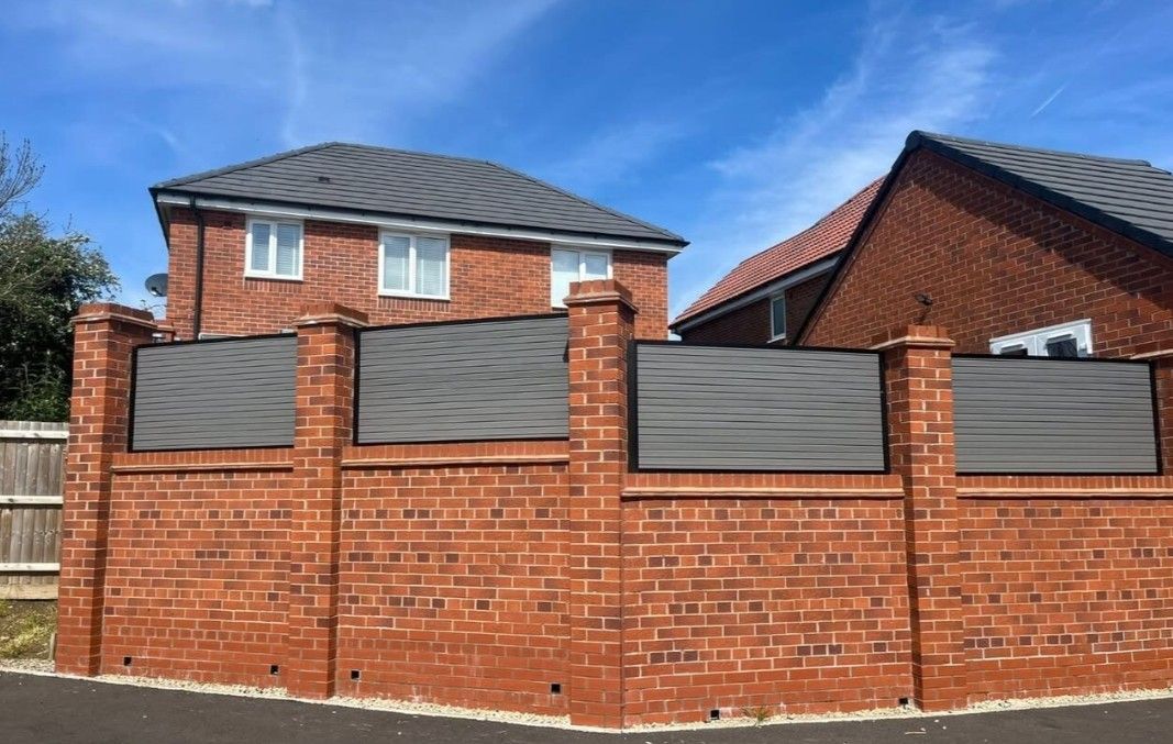 Composite Gates UK Wall mounted composite fencing in Derby - garden side
