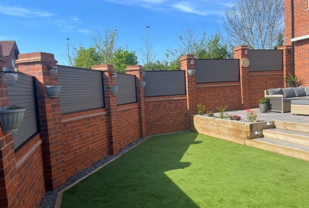 Composite Gates UK Wall mounted composite fencing in Leicester - garden side