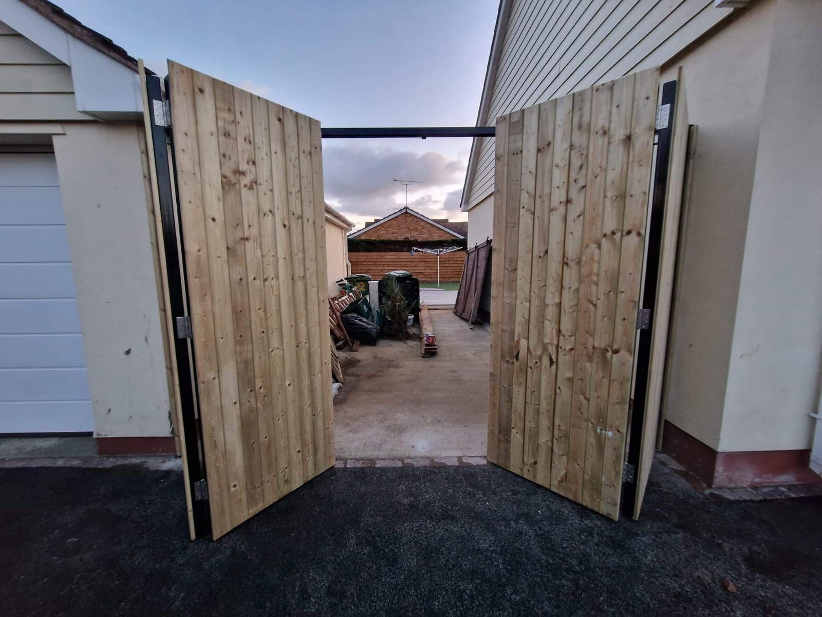 Composite Gates UK metal framed wooden bi-fold gates