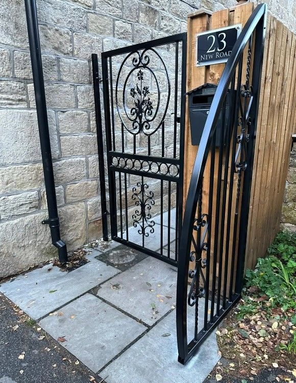 Metal garden gate and side screen in Cirencester