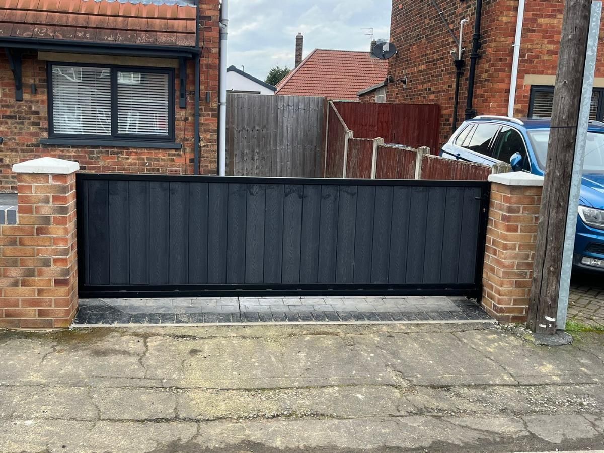 Composite Gates UK grey sliding driveway gate