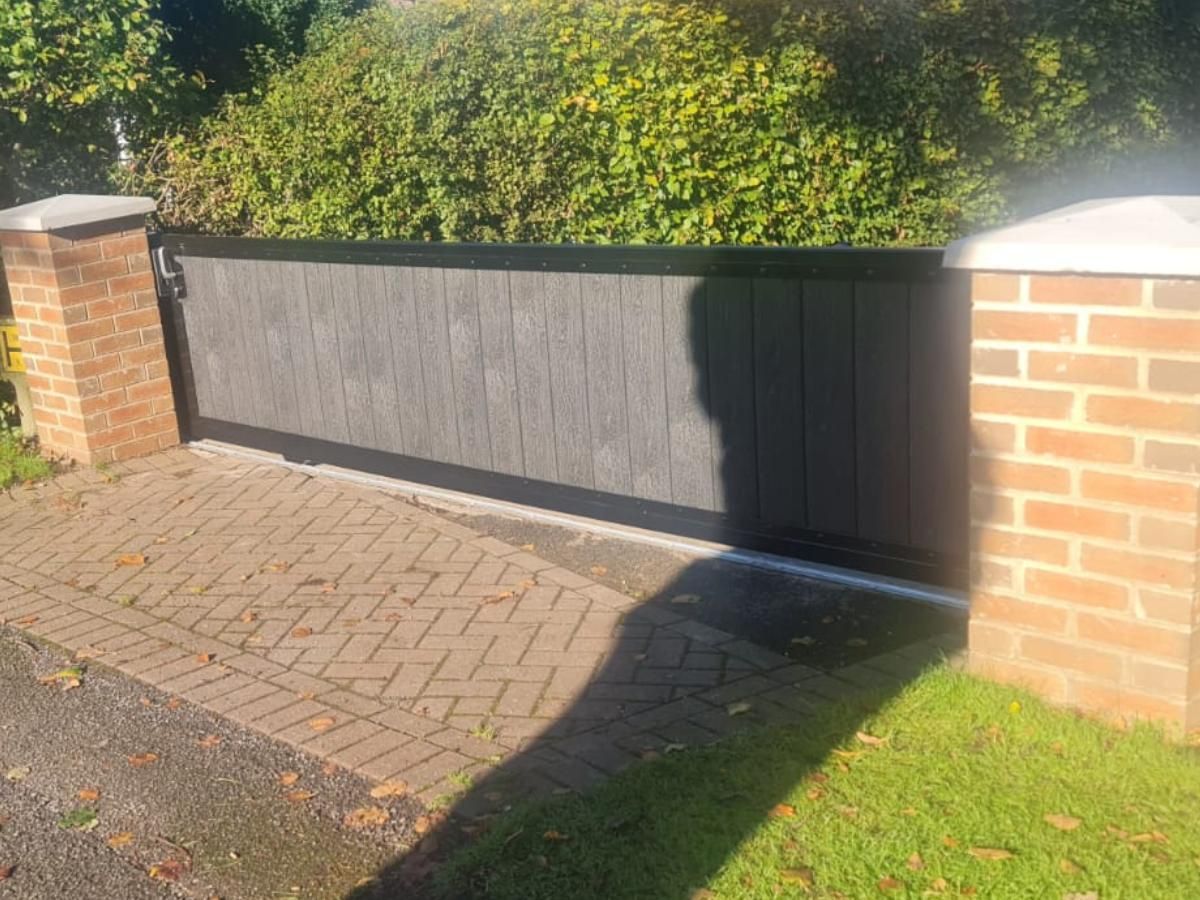 Composite Gates UK single sliding grey composite driveway gate