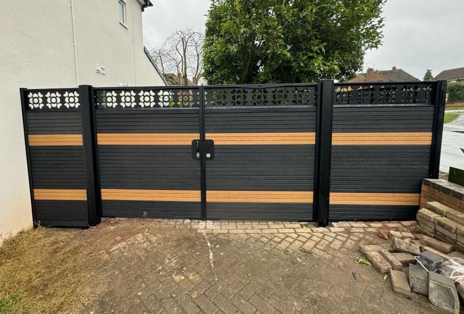 Chocolate composite driveway gates with trellis topper installed in 
Blackpool